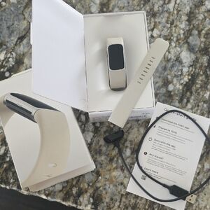 Fitbit Wearable with Beige Band